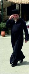 Priest on phone