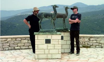 Two bronze lambs